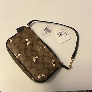Coach Tan Floral Pattern Wristlet